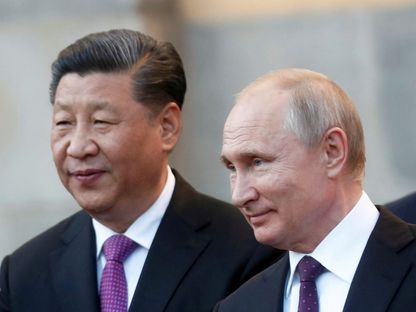الرئيس الروسي فلاديمير بوتين خلال لقاء سابق مع نظيره الصيني شي جين بينج في الكرملين بالعاصمة موسكو. 5 يونيو 2019 - REUTERS