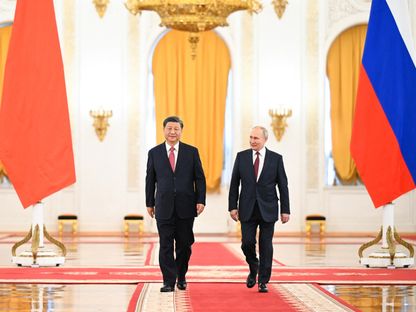 الرئيس الروسي فلاديمير بوتين إلى جانب نظيره الصيني شي جين بينج خلال زيارة الأخير إلى موسكو، روسيا. 21 مارس 2023 - AFP