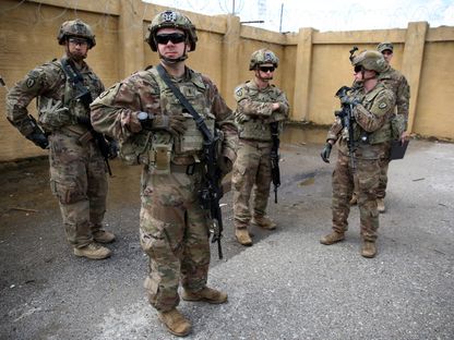 جنود أميركيون في قاعدة جوية شمال غرب كركوك بشمال العراق. 29 مارس 2020 - AFP