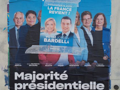 ملصق انتخابي لزعيمي حزب التجمع الوطني الفرنسي جوردان بارديلا ومارين لوبان. 12 يونيو 2024 - REUTERS