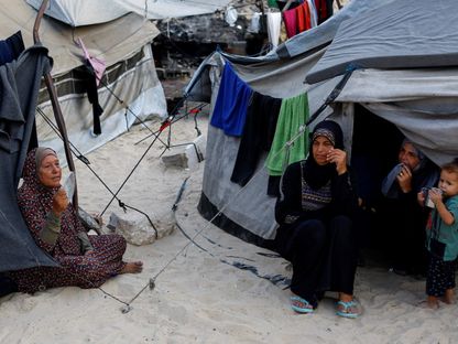 نازحون فلسطينيون في مدينة غزة جرّاء الحرب الإسرائيلية على القطاع. 12 أغسطس2025 - Reuters