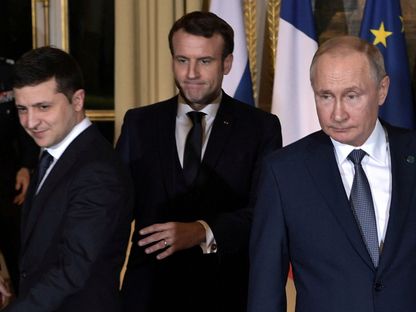 الرؤساء الروسي فلاديمير بوتين والفرنسي إيمانويل ماكرون والأوكراني فولوديمير زيلينسكي يحضرون قمة في باريس، فرنسا. 9 ديسمبر 2019 - REUTERS