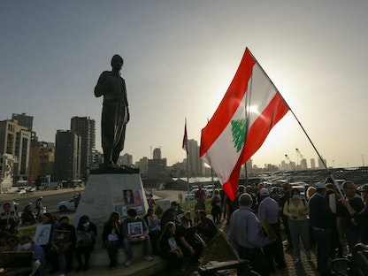 أهالي ضحايا انفجار مرفأ بيروت خلال مظاهرة قرب موقع الحادث في العاصمة- 4 أبريل 2022 - REUTERS