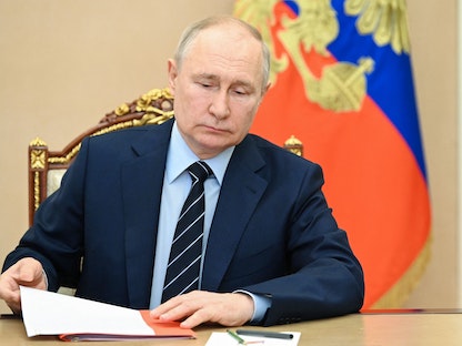 الرئيس الروسي فلاديمير بوتين خلال اجتماع حكومي في الكرملين. 14 يوليو 2023 - AFP