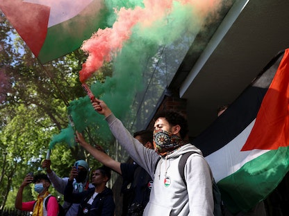 مظاهرة مساندة لفلسطين قرب السفارة الإسرائيلية بالعاصمة البريطانية لندن- 12 يونيو 2021 - REUTERS