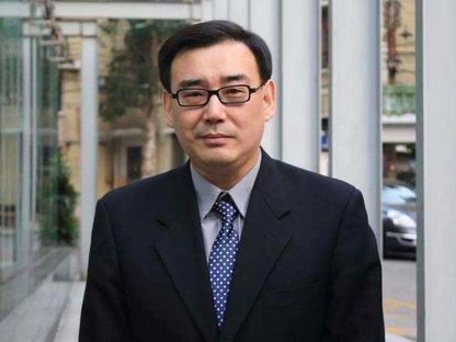 الكاتب الأسترالي الصيني يانج جون الذي تتهمه بكين بالتجسس وأصدرت بحقه حكماً بالإعدام - .
