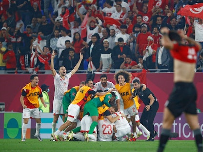 احتفال لاعبي تونس بالفوز على مصر والتأهل لنهائي كأس العرب  - AFP