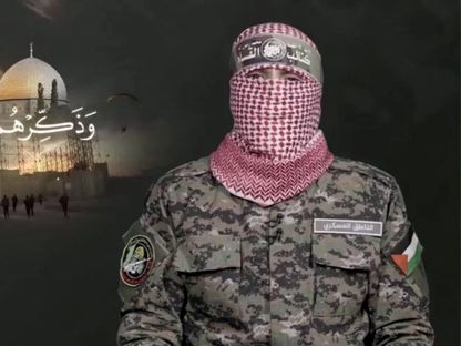 أبو عبيدة الناطق العسكري باسم كتائب القسام الجناح العسكري لحركة حماس يتحدث في الذكرى السنوية الأولى لهجوم السابع من أكتوبر على إسرائيل. 7 أكتوبر 2024 - REUTERS