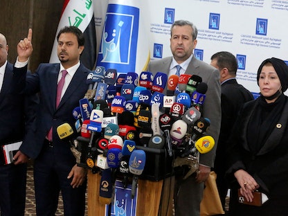 القاضي جليل عدنان في مؤتمر صحافي بشأن نتائج الانتخابات البرلمانية في العراق - 11 أكتوبر 2021 - AFP