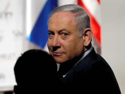 رئيس الوزراء الإسرائيلي السابق بنيامين نتنياهو خلال حضوره مؤتمراً في القدس، 8 يناير 2021 - REUTERS
