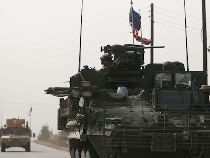 آليات أميركية في مدينة منبج السورية - REUTERS