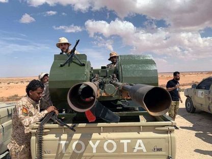 عناصر من قوات حكومة المجلس الرئاسي في ليبيا - REUTERS