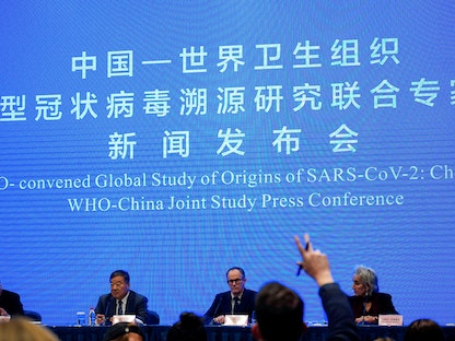 مؤتمر صحافي سابق لفريق منظمة الصحة العالمية المكلف بالتحقيق في أصول فيروس كورونا ومختصين من الصين، ووهان، 9 فبراير 2021 - REUTERS