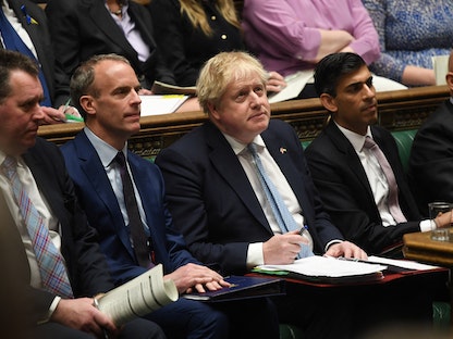 رئيس الوزراء البريطاني بوريس جونسون خلال جلسة لمجلس العموم في لندن- 30 مارس 2022 - via REUTERS