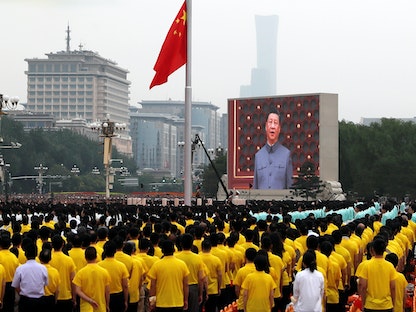 الرئيس الصيني شي جين بينغ في خطاب بمناسبة الذكرى المئوية لتأسيس الحزب الشيوعي الحاكم ببكين - 1 يوليو 2021 - REUTERS