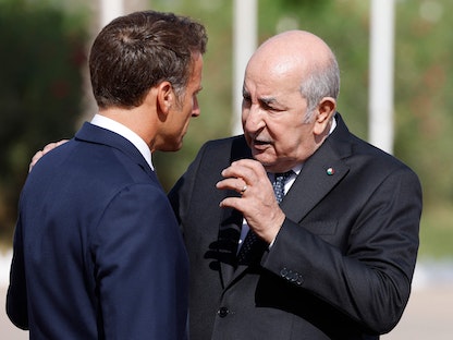 الرئيس الجزائري عبد المجيد تبون ونظيره الفرنسي إيمانويل ماكرون خلال زيارة الأخير إلى الجزائر. 27 أغسطس2022 - AFP