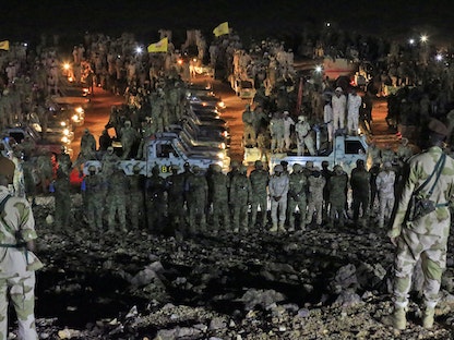 جنود سودانيون يشاركون بتمرين للجيش في ضواحي العاصمة الخرطوم، 30 أكتوبر 2019 - AFP