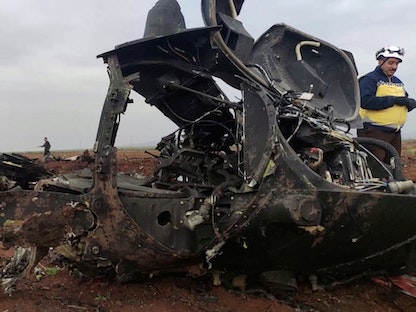 حطام طائرة هليكوبتر مدمرة شاركت في العملية الأميركية التي نُفذت ضد زعيم "داعش" قرب محافظة إدلب السورية - 3 فبراير 2022. - via REUTERS