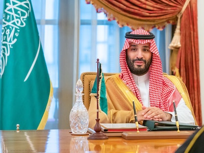 ولي العهد السعودي الأمير محمد بن سلمان خلال ترؤس اجتماع مجلس التنسيق السعودي البحريني في المنامة، 9 ديسمبر 2021. - وكالة أنباء البحرين