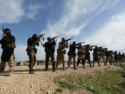 مقاتلو مجموعة "أحرار الشرقية" خلال تدريب على الرماية في شمال سوريا- 20 مارس 2017 - REUTERS