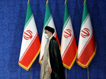 الرئيس الإيراني إبراهيم رئيسي خلال مؤتمر صحافي في طهران - VIA REUTERS