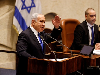 رئيس الوزراء الإسرائيلي المكلف بنيامين نتنياهو يتحدث خلال جلسة الكنيست للموافقة على تشكيل الحكومة، القدس. 29 ديسمبر 2022 - REUTERS