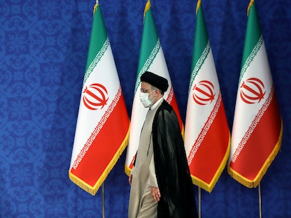 الرئيس الإيراني إبراهيم رئيسي خلال مؤتمر صحافي في طهران - 21 يونيو 2021 - VIA REUTERS