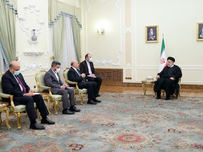 الرئيس الإيراني خلال استقباله وزير الخارجية العراقي فؤاد حسين، طهران- 30 أغسطس 2022 - وكالة الأنباء الإيرانية