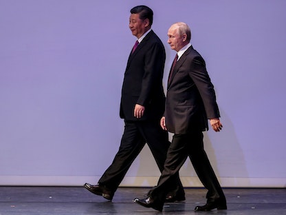الرئيسان الروسي فلاديمير بوتين والصيني شي جين بينج خلال زيارة الأخير إلى موسكو. - REUTERS