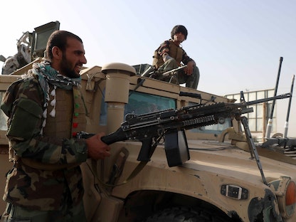 جنود أفغان عند نقطة تفتيش في ولاية هرات - 9 يوليو 2021 - REUTERS