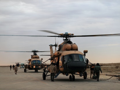 طائرات مروحية تابعة للقوات الجوية العراقية تهبط في قاعدة عين الأسد الجوية في الأنبار بالعراق - 29 ديسمبر 2019 - REUTERS