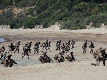 تدريبات عسكرية لقوات الناتو في قاعدة روتا الإسبانية - 15 يونيو 2022 - REUTERS