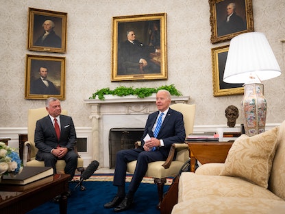الرئيس الأميركي جو بايدن بجانب الملك الأردني عبد الله الثاني في البيت الأبيض، 19 يوليو 2021 - Bloomberg