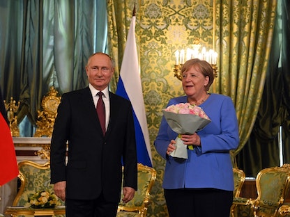 الرئيس الروسي فلاديمير بوتين يستقبل المستشارة الألمانية أنجيلا ميركل في موسكو - 20 أغسطس 2021 - AFP