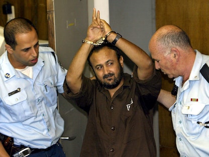 مروان البرغوثي أثناء محاكمته في إسرائيل. 20 مايو 2004. - REUTERS