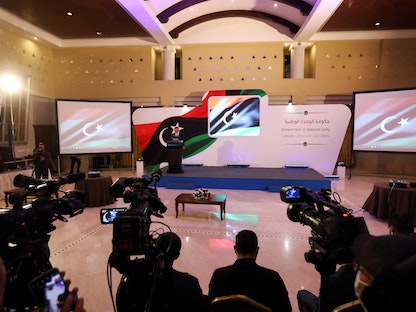 رئيس الوزراء الليبي المكلف عبد الحميد الدبيبة يتحدث خلال مؤتمر صحافي في طرابلس- 25 فبراير 2021 - REUTERS