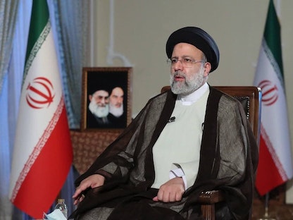 الرئيس الإيراني إبراهيم رئيسي خلال مقابلة تلفزيونية - 18 أكتوبر 2021 - img9.irna.ir