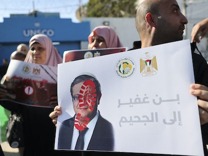 فلسطينيون خلال مظاهرة في غزة ضد وزير الأمن القومي الإسرائيلي اليميني المتطرف إيتمار بن جفير. 11 يناير 2023 - AFP