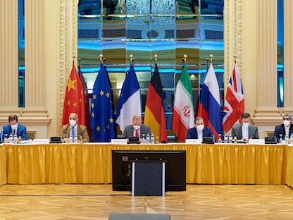 فرق التفاوض خلال محادثات فيينا لإحياء الاتفاق النووي الإيراني، 20 يونيو 2021 - REUTERS