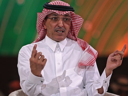 وزير المالية السعودي محمد الجدعان يتحدث خلال جلسة في المؤتمر السنوي لمبادرة الاستثمار المستقبلي (FII) في الرياض. 26 أكتوبر 2022 - AFP