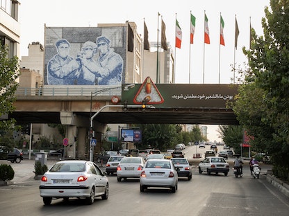 جدارية للممرضات الإيرانيات، مع ارتفاع حالات الإصابة بفيروس كورونا، في طهران، إيران، 11 أغسطس 2021   - VIA REUTERS