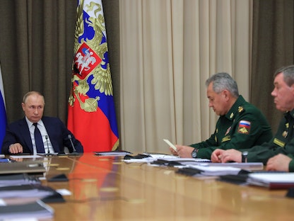Russian President Vladimir Putin chairs a meeting in Sochi - via REUTERS
