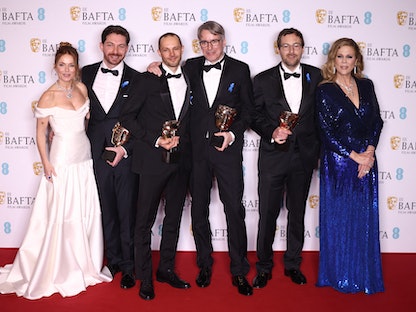 نجوم فيلم "All Quiet On The Western Front" بعد استلام جوائزهم في حفل الأكاديمية البريطانية لفنون السينما والتلفزيون (بافتا)- 19 فبراير 2023 - REUTERS