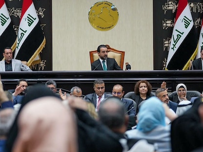 رئيس البرلمان العراقي محمد الحلبوسي خلال جلسة التصويت على مشروع قانون الأمن الغذائي - 08 يونيو 2022 - وكالة الأنباء العراقية "واع"