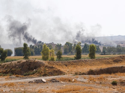 دخان يتصاعد من مقر حزب الحرية الكردستاني في كردستان العراق، بعد ضربة الحرس الثوري الإيراني على مشارف مدينة كركوك. 28 سبتمبر 2022 - REUTERS