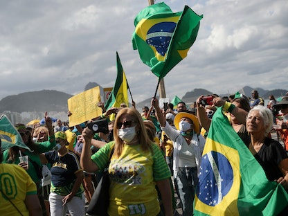 أنصار للرئيس البرازيلي جايير بولسونارو يتظاهرون في ريو دي جانيرو - 1 أغسطس 2021 - REUTERS