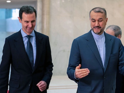 الرئيس السوري بشار الأسد يستقبل وزير الخارجية الإيراني حسين أمير عبد اللهيان في دمشق. 14 يناير 2023 - AFP