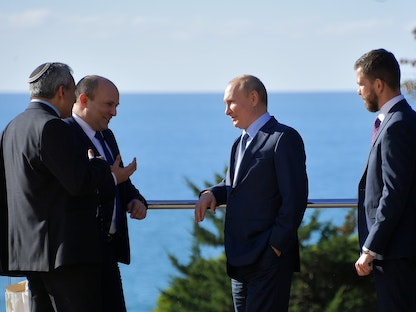 الرئيس الروسي فلاديمير بوتين يلتقي رئيس الوزراء الإسرائيلي نفتالي بينيت في منتجع سوتشي، روسيا- 22 أكتوبر 2021   - REUTERS