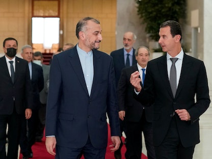 الرئيس السوري بشار الأسد يستقبل وزير الخارجية الإيراني حسين أمير عبد اللهيان، دمشق - 29 أغسطس 2021. - REUTERS