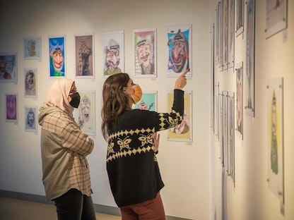 جانب من معرض الكاريكاتير الذي ضم رسومات عن الزعيم الراحل ياسر عرفات - 24 يناير 2022 - facebook.com/YasserArafatFoundationOfficial